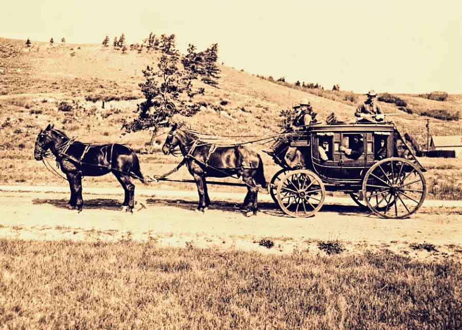 image depicting a stagecoach in the Wild West