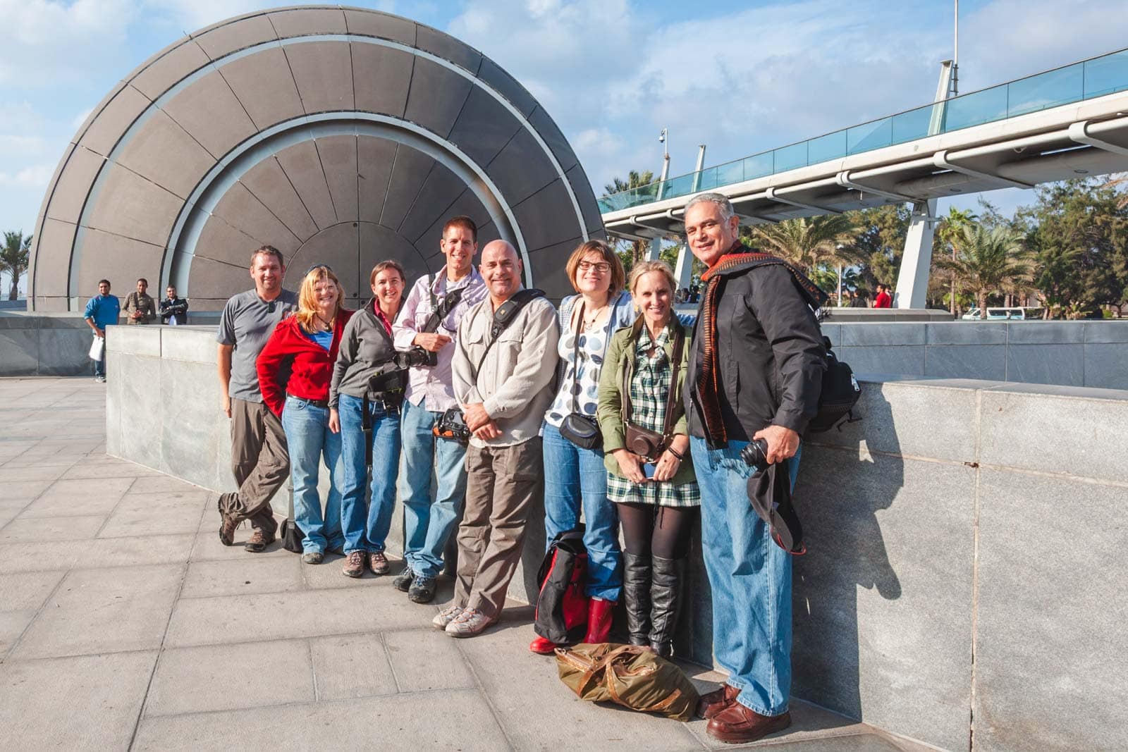 our small tour group listening to our Egyptologist guide in Cairo, Egypt, showing the benefit of a guided tour for safety and context.